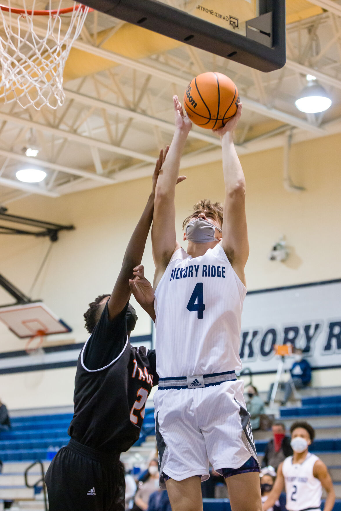 Boys Basketball: Hickory Ridge RaginÕ Bulls defeated the Northwest Cabarrus Trojans 64-56.